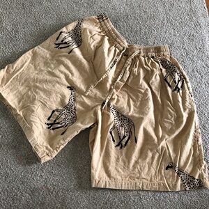 Vintage tan high-rise cotton shorts with giraffe print in size XL